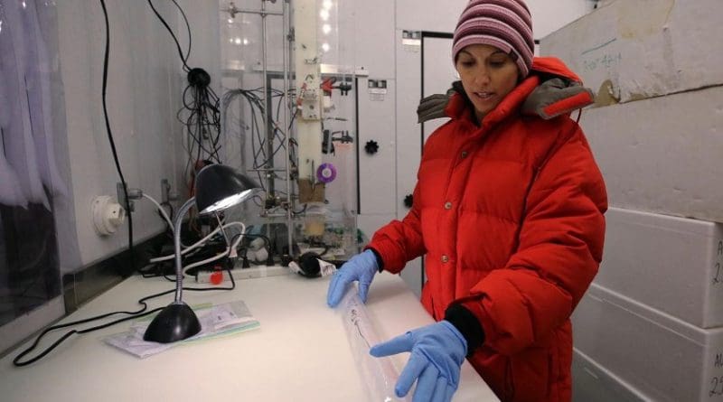 Dr. Monica Arienzo inspects an ice core sample in the ice core lab at the Desert Research Institute in Reno, Nev. Credit DRI