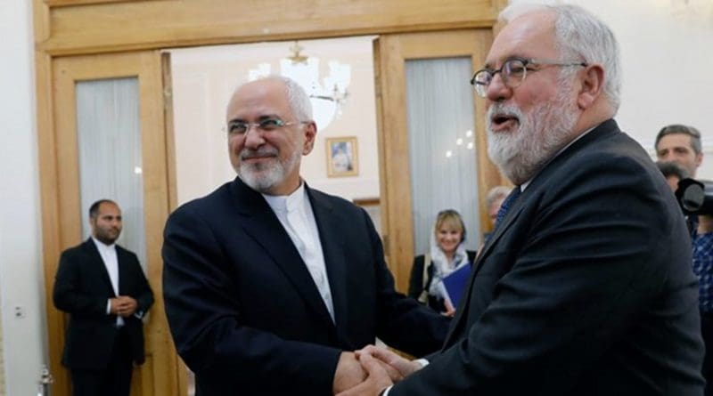 haking hands between Mohamad Javad Zarif, Iranian Foreign Minister and Miguel Arias Canete. [European Commission]