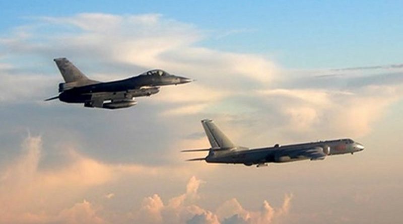 Taiwan's F-16 fighter jet (L) monitors one of two Chinese H-6 bombers that flew over the Bashi Channel south of Taiwan and the Miyako Strait, near Japan's Okinawa Island, in photo taken and released on May 25, 2018 by Taiwan's defense ministry.