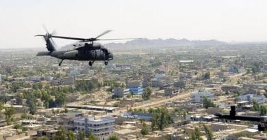 A U.S. Army UH-60 Black Hawk helicopter flies over Farah City, Afghanistan, May 19, 2018. Afghan forces defeated a Taliban offensive to retain control of the city earlier in the week. Air Force photo by Tech. Sgt. Sharida Jackson