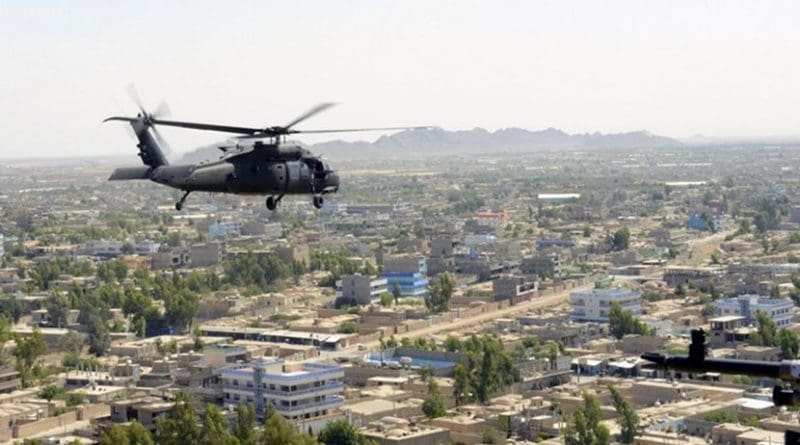 A U.S. Army UH-60 Black Hawk helicopter flies over Farah City, Afghanistan, May 19, 2018. Afghan forces defeated a Taliban offensive to retain control of the city earlier in the week. Air Force photo by Tech. Sgt. Sharida Jackson