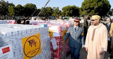 Morocco's King Mohammed VI views aid shipment being sent to Palestinians.