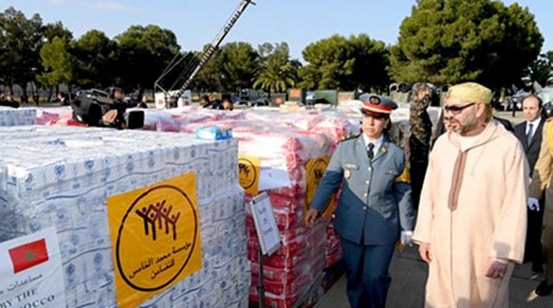 Morocco's King Mohammed VI views aid shipment being sent to Palestinians.
