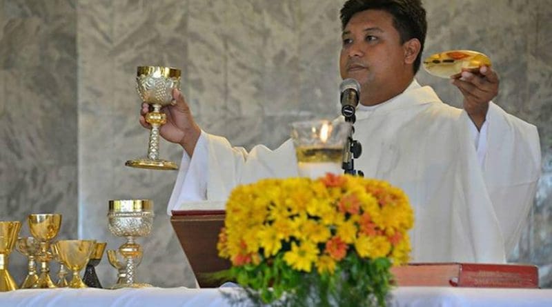 Father Mark Anthony Yuaga Ventura, 37, is seen celebrating Mass in this undated photo. (Photo by Maria Tan, UCAN)
