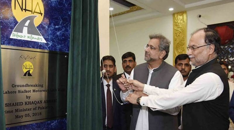 Interior Minister Ahsan Iqbal (right) and Prime Minister Shahid Khaqan Abbasi perform a ground-breaking ceremony for a motorway project on May 5. (Photo courtesy of Press Information Department, Government of Pakistan)