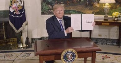 US President Donald Trump signs a Presidential Memorandum on the Iran nuclear deal. Photo Credit: White House video screenshot.