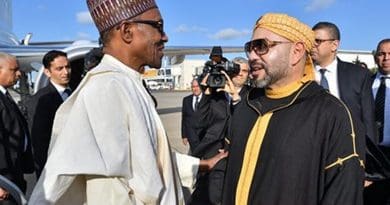 Morocco's King Mohammed VI greets Nigeria's President Muhammadu Buhar.i