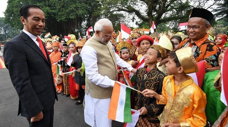 The President of Indonesia, Mr. Joko Widodo welcomes the Prime Minister, Shri Narendra Modi, on his arrival at Istana Merdeka, in Jakarta, Indonesia. Photo Credit: India PM office.