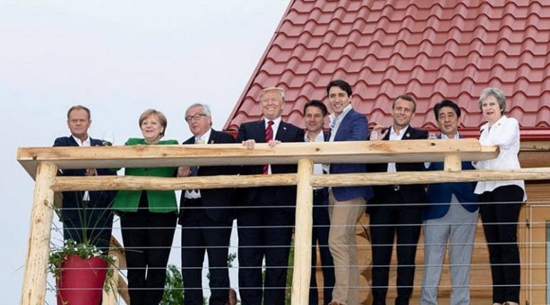 Leaders of the G7 at Black Bear Chalet in La Malbaie, Quebec, before their Working Dinner. From left are: Council President of the European Union Donald Tusk; Chancellor Angela Merkel of Germany; Commission President of the EU Jean-Claude Juncker; President Donald J. Trump; Prime Minister Giuseppe Conte of Italy; Prime Minister Justin Trudeau of Canada; President Emmanuel Macron of France; Prime Minister Shinzo Abe of Japan, and Prime Minister Theresa May of the United Kingdom. (Official White House Photo by Shealah Craighead)