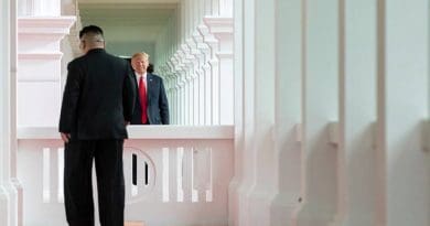 President Donald J. Trump watches as North Korean leader Kim Jong Un, walks toward him for their first-ever meeting, Tuesday, June 12, 2018, at the Capella Hotel in Singapore. (Official White House Photo by Stephanie Chasez)