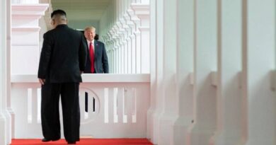 President Donald J. Trump watches as North Korean leader Kim Jong Un, walks toward him for their first-ever meeting, Tuesday, June 12, 2018, at the Capella Hotel in Singapore. (Official White House Photo by Stephanie Chasez)