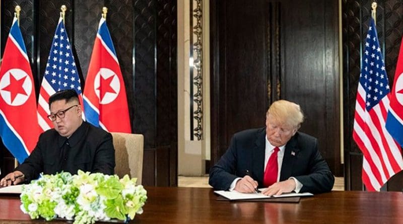 President Donald J. Trump and North Korean leader Kim Jong Un sign joint statement, Tuesday, June 12, 2018, at the Capella Hotel in Singapore. Photo Credit: White House.