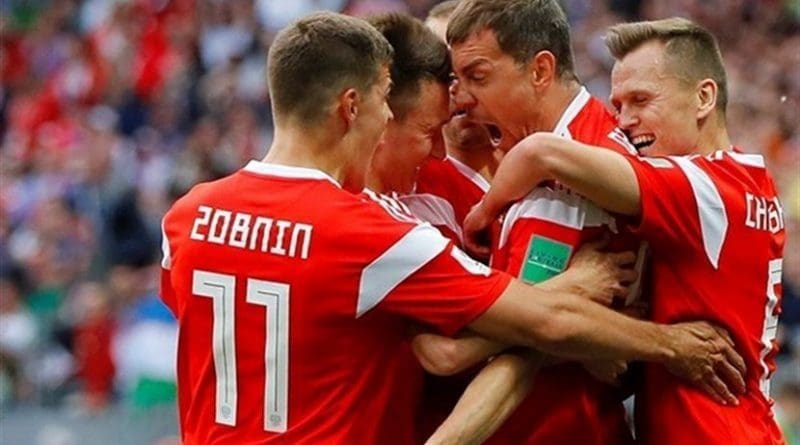 Russia football players celebrate goal in 5-0 rout over Saudi Arabia in World Cup. Photo Credit: Tasnim News Agency.