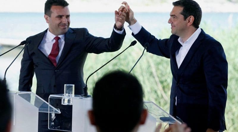 Macedonian PM Zoran Zaev [left] and Greek PM Alexis Tsipras [right] in the border village of Psarades. Photo: EPA