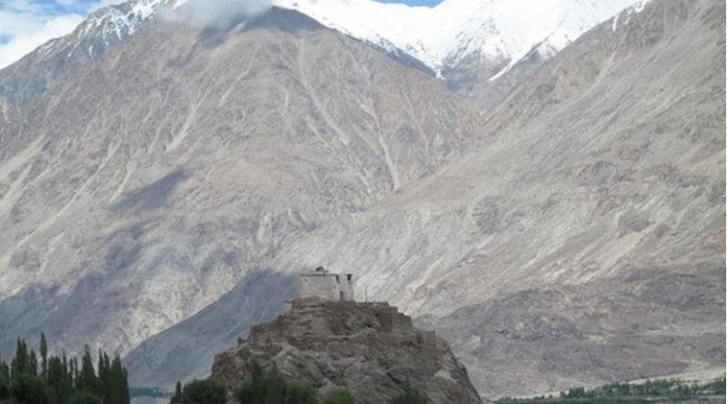 This is a temple in the Nubra Valley of Ladakh, India, which is in the study area. The picture illustrates the enormous size and scale of the mountains in this part of the Himalayas. Credit Wendy Bohon