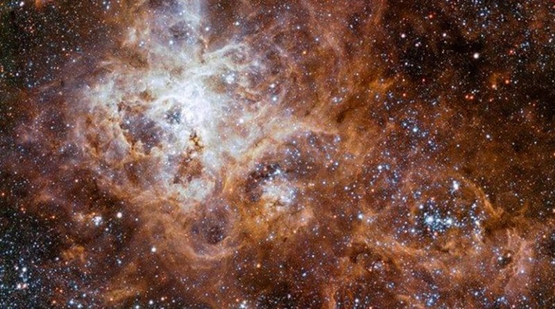 Fresh insight into intense star formation events- - such as this gigantic star-forming region in the Large Magellanic Cloud galaxy -- are challenging scientists' understanding of the Universe. Credit ESO