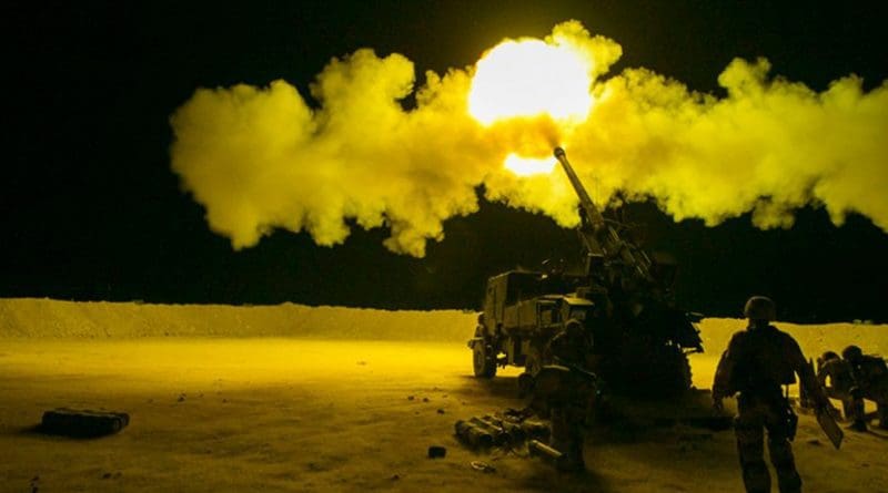 French soldiers, assigned to Task Force Wagram, conduct an evening fire mission in support of Operation Roundup in Qaim, Iraq, May 16, 2018. As a nonpermanent force, the coalition aims to enable the Iraqi security forces to be self-sufficient. Army photo by Spc. Zakia Gray