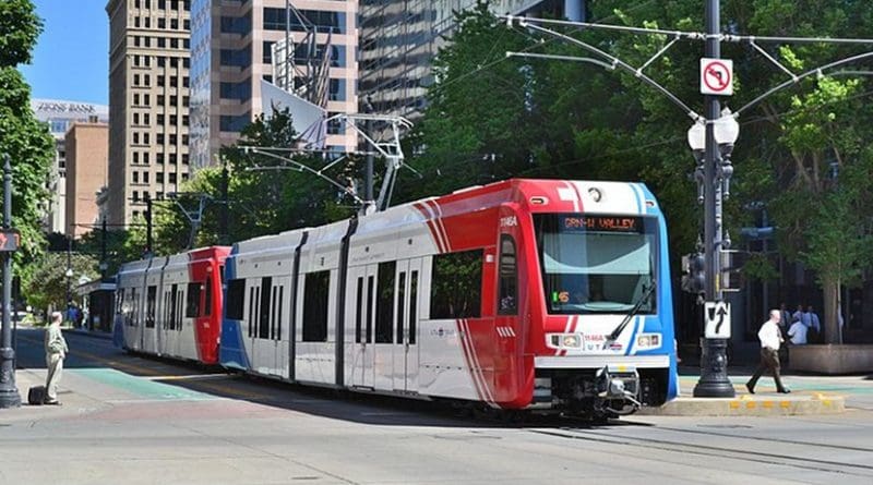 A Utah Transit Authority Trax light rail vehicle traveling south on the green line in downtown Salt Lake City. Photo by Garrett, Wikimedia Commons.