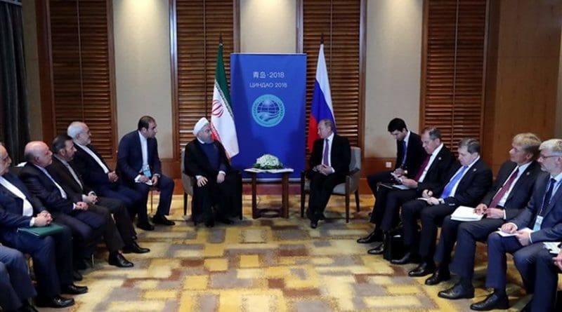 Iranian President Hassan Rouhani and his Russian counterpart Vladimir Putin on the sidelines of the Shanghai Cooperation Organization summit in China’s Qingdao. Photo Credit: Tasnim News Agency.