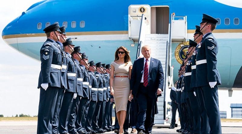 US President Donald Trump and First Lady Melania Trump walk off Air Force One as they arrive at London Stansted Airport in Stansted, England. Photo Credit: White House.