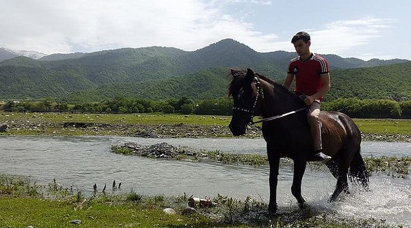 Pankisi Gorge in Georgia, Kist boy with horse. Photo Credit: Sulkhan Bordzikashvili, Wikimedia Commons.