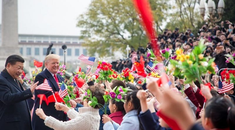 President Donald J. Trump and President Xi Jinping meet children waving Chinese and U.S. flags at welcoming ceremonies outside the Great Hall of the People, Thursday, November 9, 2017, in Beijing, People’s Republic of China. (Official White House Photo by Shealah Craighead)