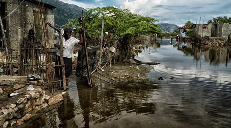 After serious flooding in Haiti’s north, its government, with support of United Nations Mission in Haiti and other UN agencies, responded with evacuations, temporary shelters, and distribution of food and supplies, November 11, 2014 (UN/Logan Abassi)