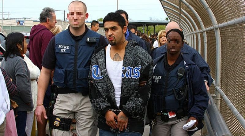 U.S. Immigration and Customs Enforcement (ICE) Agents deport a man back to Mexico. Photo Credit: U.S. Immigration and Customs Enforcement, Wikimedia Commons.