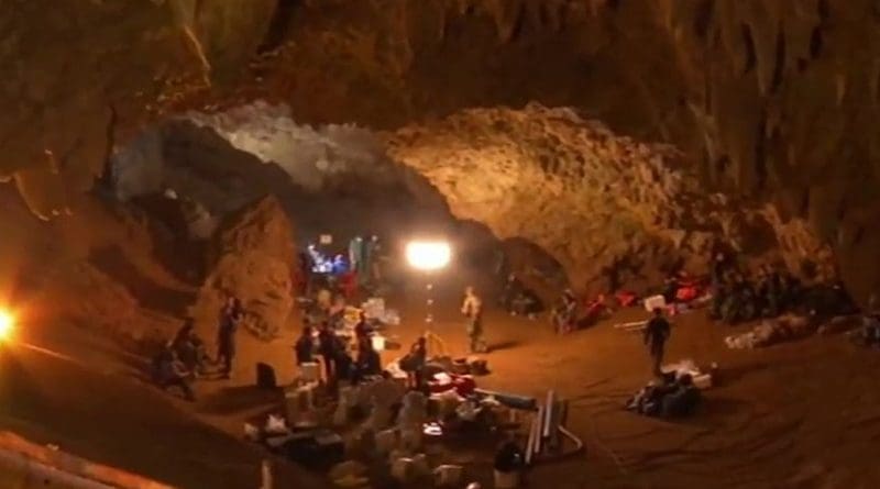 Personnel and equipment in the entrance chamber of Tham Luang (Thailand) cave during rescue operations. Photo Credit: NBT, YouTube, Wikimedia Commons.