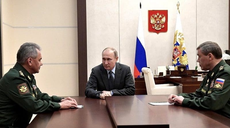 Russia's President Vladimir Putin meets with Defence Minister Sergei Shoigu and Chief of the General Staff of Russia’s Armed Forces Valery Gerasimov. Photo Credit: Kremlin.ru