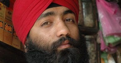 Afghan Sikh, running a shop in Kabul. Photo Credit: Koldo Hormaza, Wikipedia Commons.