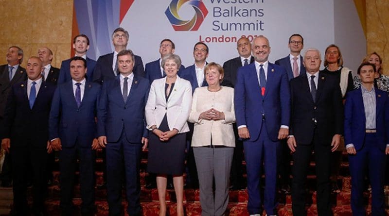 Attendees of the Western Balkans Summit 2018, including British Prime Minister Theresa May and Germany's Chancellor Angela Merkel pose for a 'family photo' at the Western Balkans Summit 2018 in London. Photo: EPA-EFE/LUKE MACGREGOR/POOL
