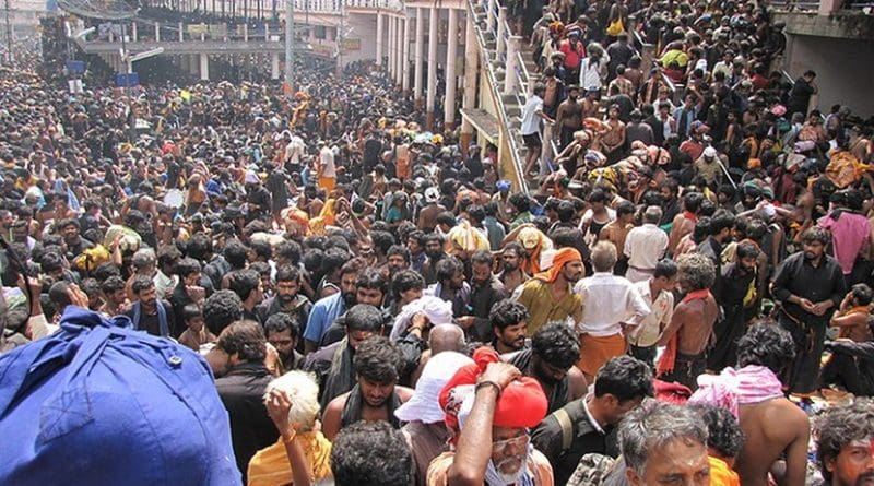Pilgrims gathering in Sabarimala, India. Photo Credit: Avsnarayan, Wikipedia Commons.