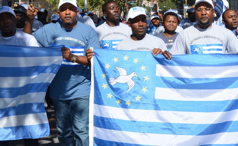 Southern Cameroonian expats marching in support of the Ambazonian cause. Photo Credit: Lambisc, Wikipedia Commons.