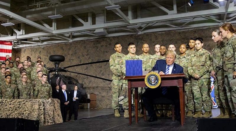 US President Donald Trump Signs Fiscal 2019 Defense Authorization Act At Fort Drum Ceremony. Photo Credit: White House.
