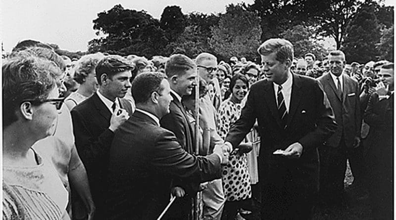 John F. Kennedy greets Peace Corps volunteers. Photo Credit: Abbie Rowe, U.S. National Archives, Wikipedia Commons.