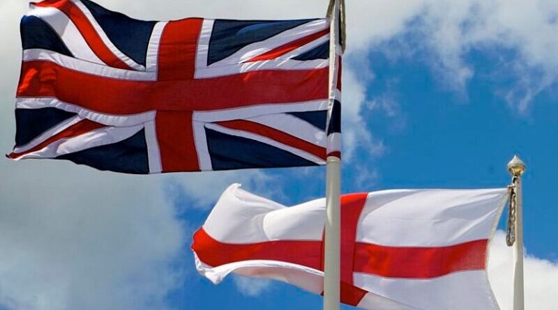 The flag of England flying alongside the flag of the United Kingdom. Photo Credit, Thor, Wikipedia Commons
