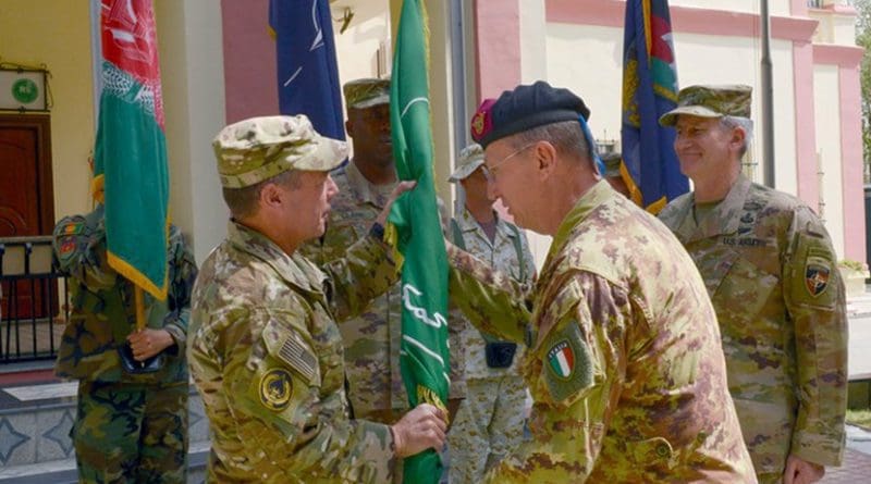 Italian army Gen. Riccardo Marchio, right, commander of NATO’s Allied Joint Force Command Brunssum, passes the Resolute Support Mission flag to U.S. Army Gen. Austin S. Miller, the incoming Resolute Support Mission commander, during a change-of-command ceremony in Kabul, Afghanistan, Sep. 2, 2018. Air Force photo by Tech. Sgt. Sharida Jackson