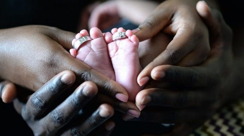 baby couple parents family