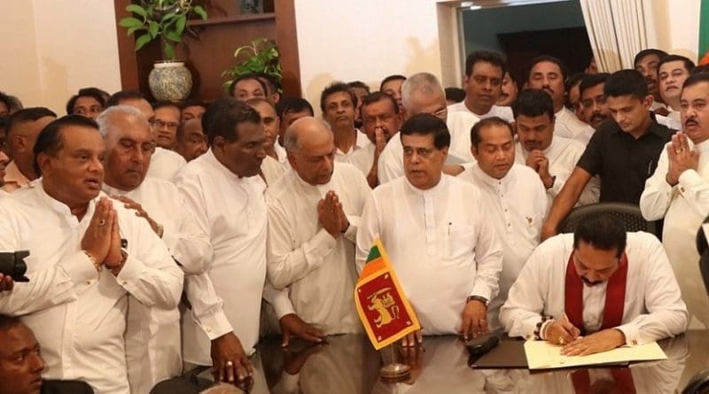 Sri Lanka's Mahinda Rajapaksa assumes duties of Prime Minister. Photo Credit: Sri Lanka government.