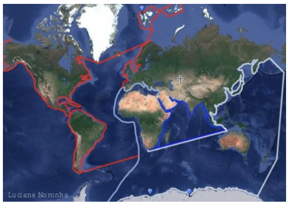 Figure 1: India's primary and secondary areas of interest according to its 2015 Maritime Strategy (in blue) and a proposed third area of interest in the Atlantic Ocean (in red). Blue pins represent research stations in Antarctica and the Arctic. Map made by the author.