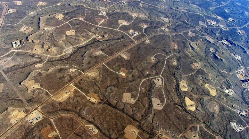 This is an aerial view of hydraulic fracturing operations across the Jonah field, a large natural gas field in Wyoming. Credit EcoFlight