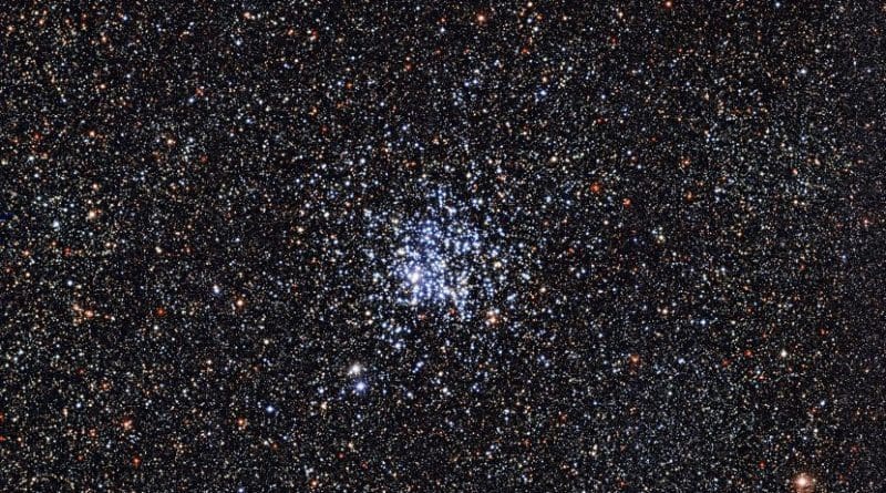 An image of the Wild Duck Cluster was captured by the MPG/ESO 2.2-metre telescope at the La Silla Observatory in Chile. The blue stars at the center of the image are the stars of the cluster. Every star in the Wild Duck Cluster is roughly 250 million years old. Older, redder stars surround the cluster. Credit European Southern Observatory