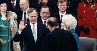 Chief Justice William Rehnquist administering the oath of office to President George H. W. Bush during Inaugural ceremonies at the United States Capitol. January 20, 1989. Photo Credit: Wikimedia Commons.