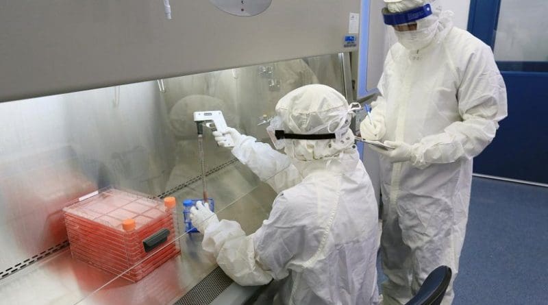 Technicians work in the ISO-certified cleanroom laboratory at Cincinnati Children's, where gene-correction therapies are tested and produced for clinical trials like the one for sickle cell anemia presented by Punam Malik MD, at this year's annual meeting of the American Society of Hematology in San Diego. Credit Cincinnati Children's