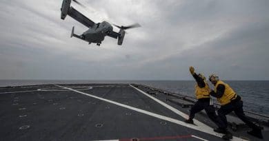Sailors signal to MV-22 Osprey during flight quarters aboard USS Ashland, East China Sea, March 10, 2017 (U.S. Navy/Kaleb R. Staples)