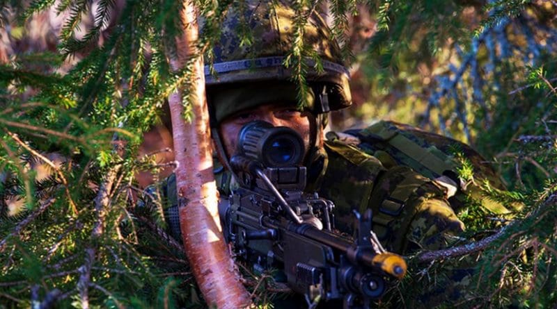 A sapper assigned to 5 Combat Engineer Regiment, Canadian Military Engineers, mans his gun during NATO exercise Trident Juncture in Kivkne, Norway. Photo Credit: Navy Petty Officer 1st Class Abraham Essenmacher