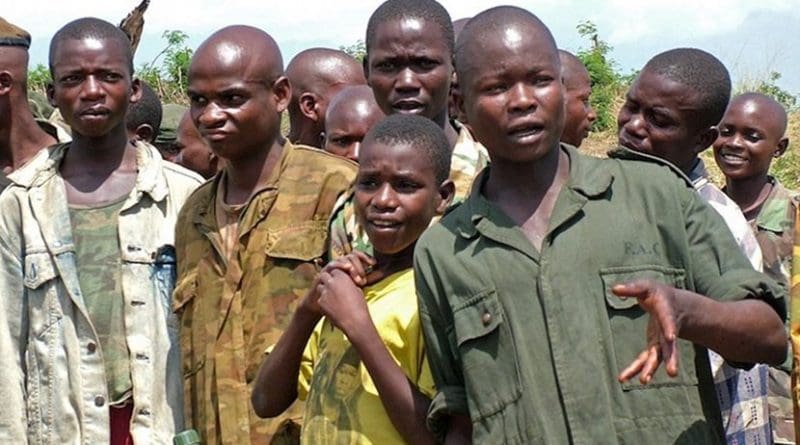 A group of demobilized child soldiers in the Democratic Republic of the Congo (2000-2007). Credit: Wikimedia Commons.