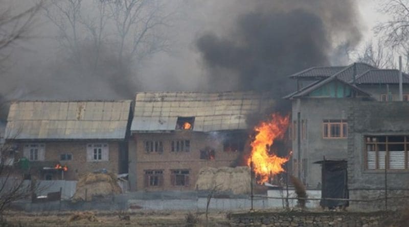 A house burns after security forces set it on fire in Kashmir’s Pulwama district to force suspected militants out, Feb 18, 2019. Photo Credit: Sheikh Mashooq/ BenarNews