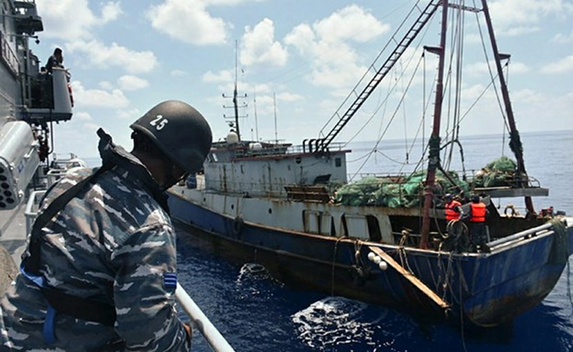 File photo of Indonesian troops capturing a Chinese fishing boat in the Natuna Sea. Photo Credit: Indonesian Navy